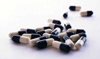 White and black antibiotic capsules