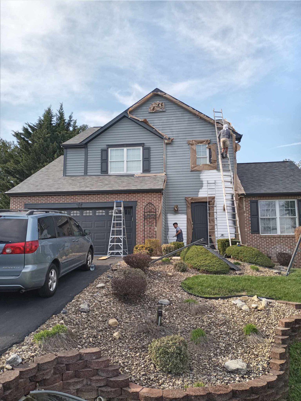 Exterior of a house being painted