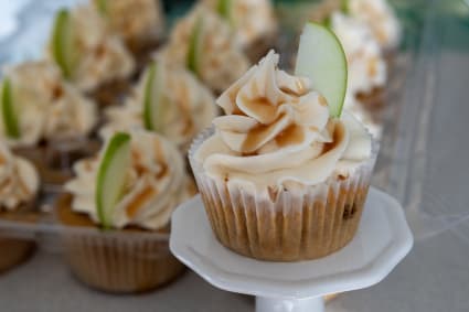 Apple caramel cupcakes with an apple slice garnish