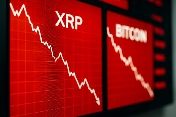 XRP Tumbles Below $1.30 as CLARITY Act Stalls in Congress