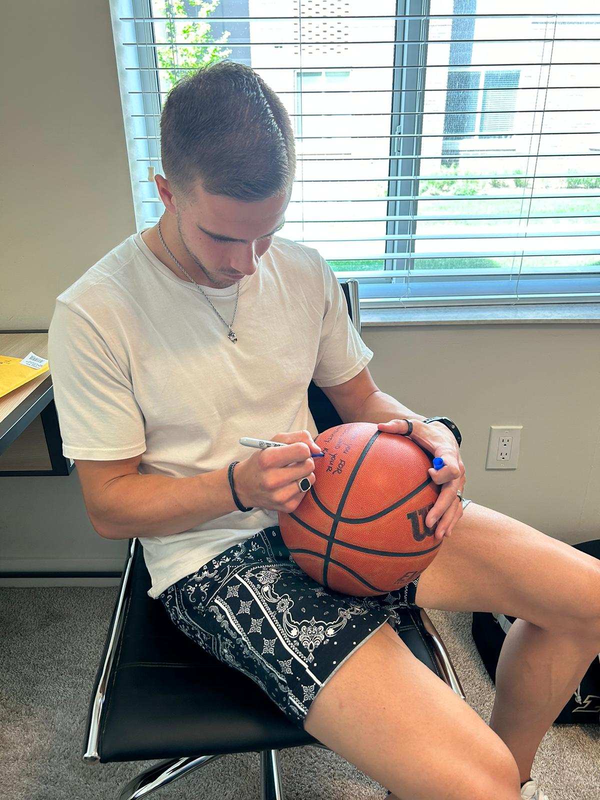 Probably the first and last time someone will get a signed basketball from me...