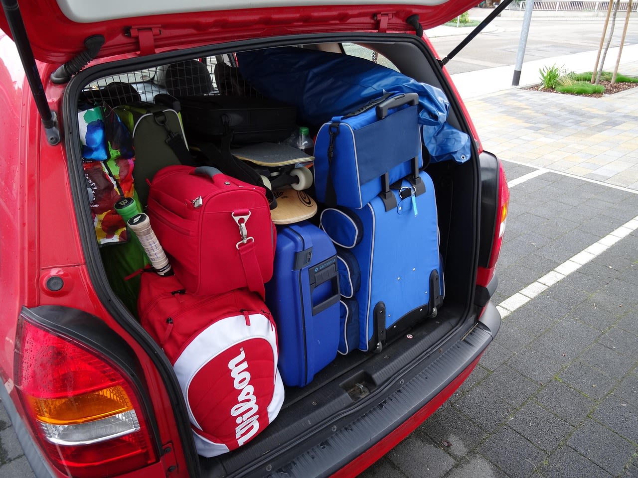 Car trunk packed with luggage after a vacation