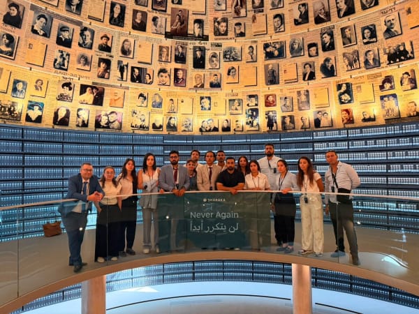 Delegation in the Hall of Names at Yad Vashem