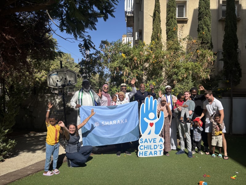 Sharaka delegation with children during a Save a Child's Heart visit