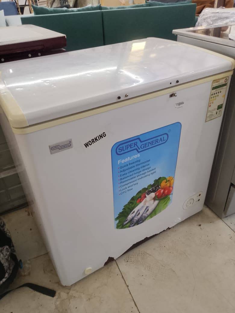 Front view of used Super General chest freezer showing working condition label and energy rating sticker