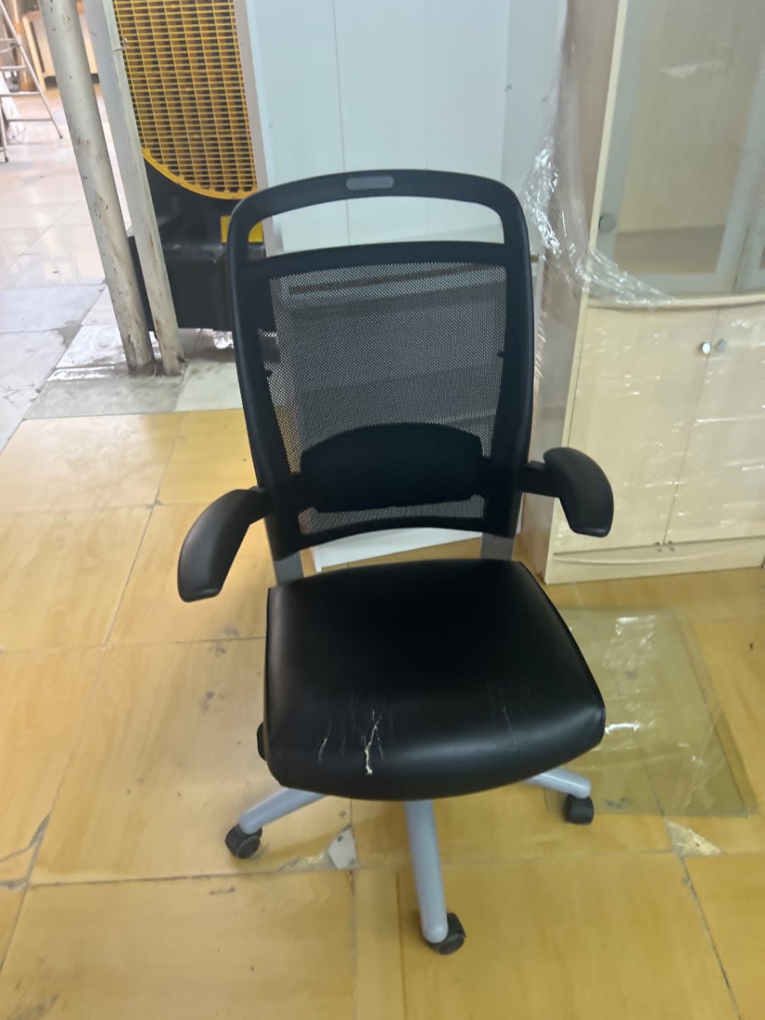 Additional front view of used black mesh back office chair at Bufaisal Shop D Ajman