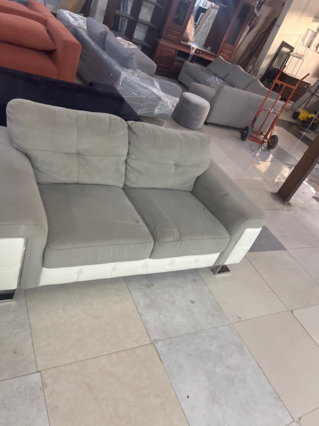 Bufaisal barcode label for used grey and white 3+2 seater sofa set at Shop D Ajman