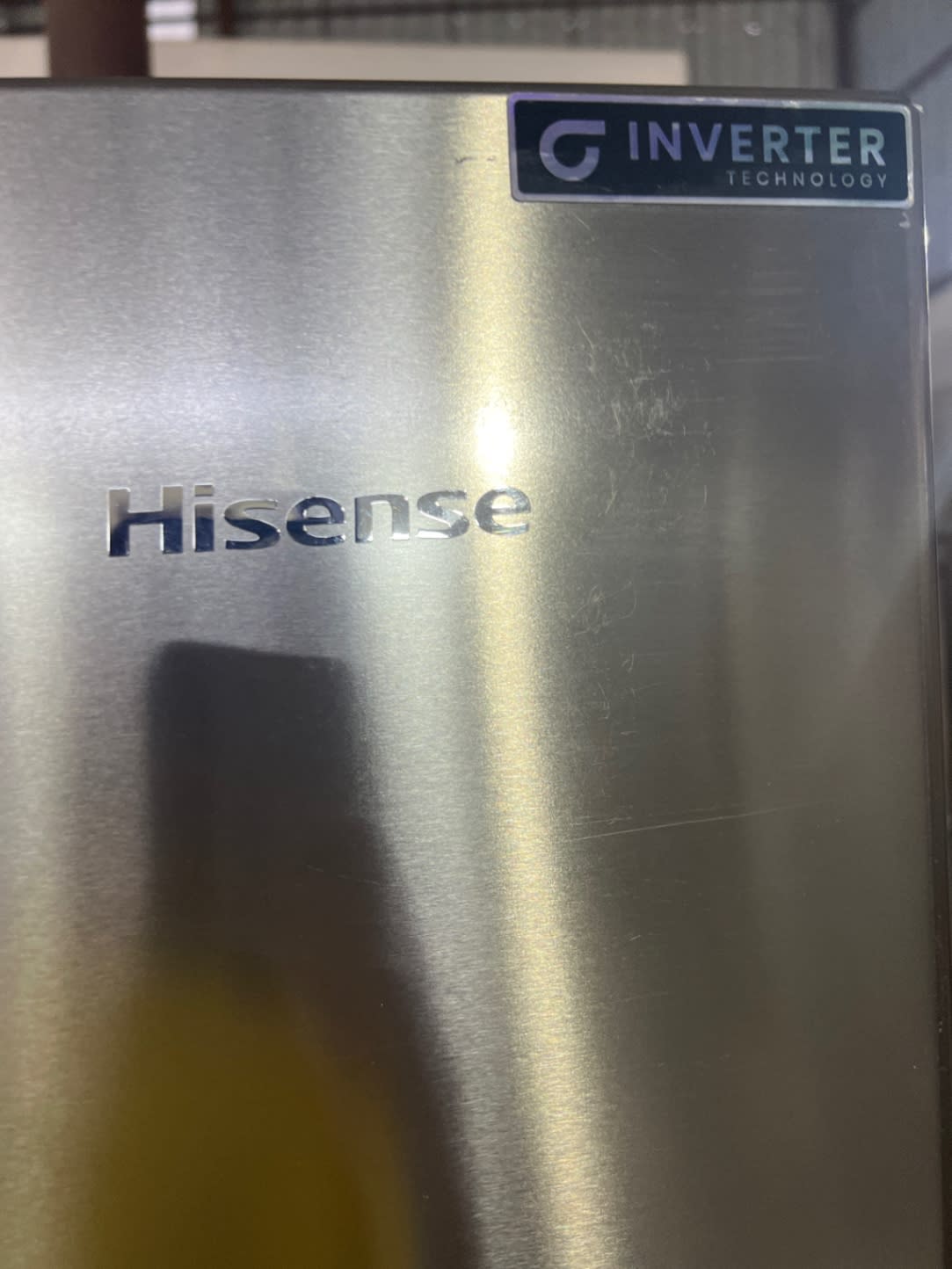Bufaisal barcode label for used Hisense side-by-side refrigerator at Shop D Ajman
