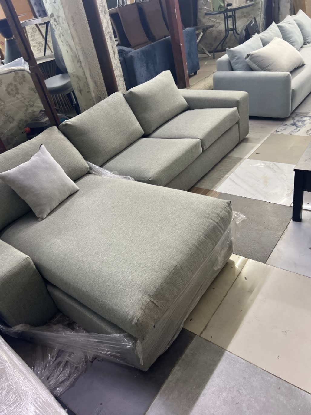 New L-shape sectional sofa grey fabric another angle showing chaise detail at Bufaisal Ajman