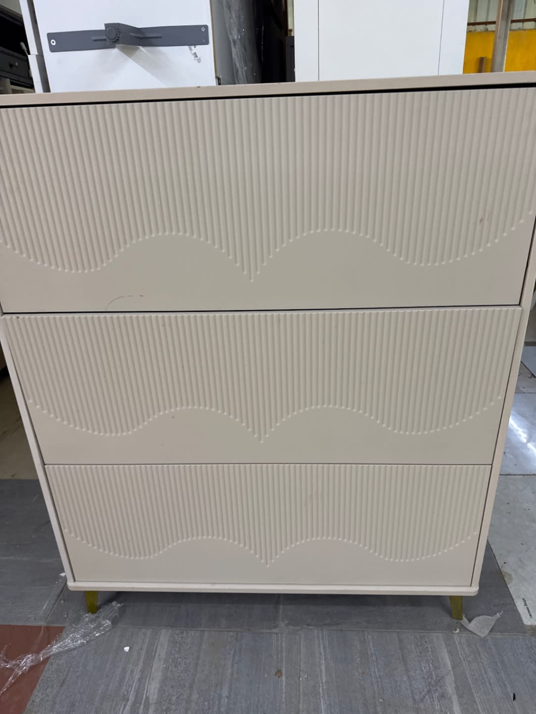 Bufaisal barcode label for used beige 3-compartment shoe rack at Shop B Ajman