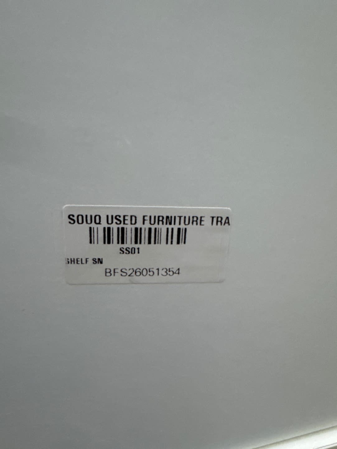 Bufaisal barcode label BFS26051354 for used white 8-cube storage shelf