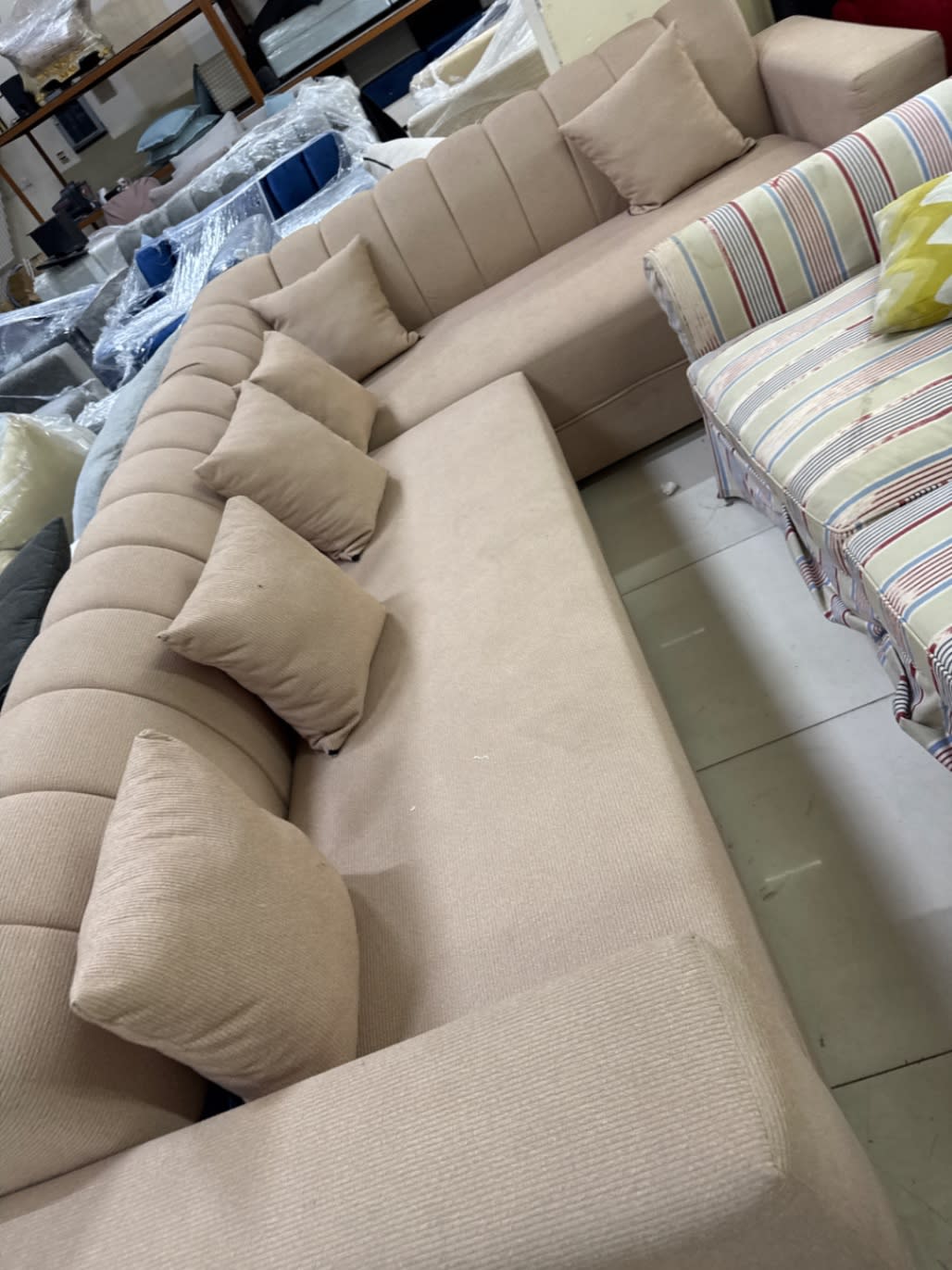 Barcode label for new L-shape sectional sofa at Bufaisal Ajman