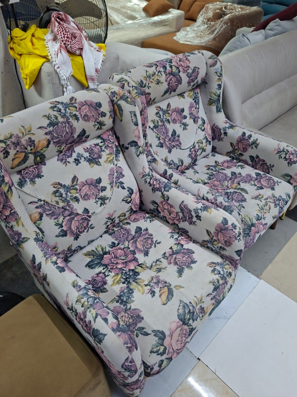 Fourth photo of used floral fabric armchair showing seat and backrest detail at Bufaisal Shop E Ajman