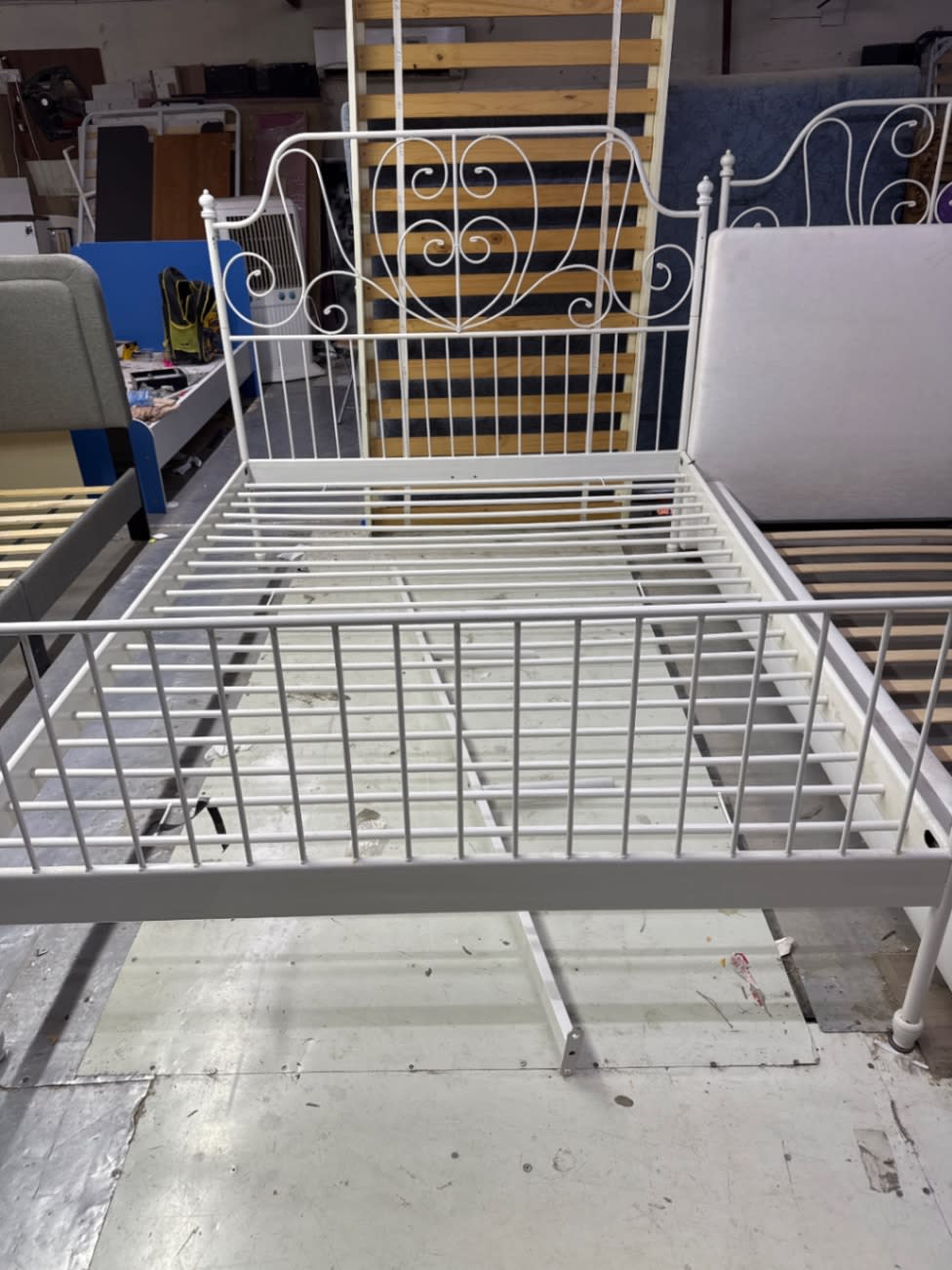 Bufaisal item label for used double metal bed frame at Shop A Ajman