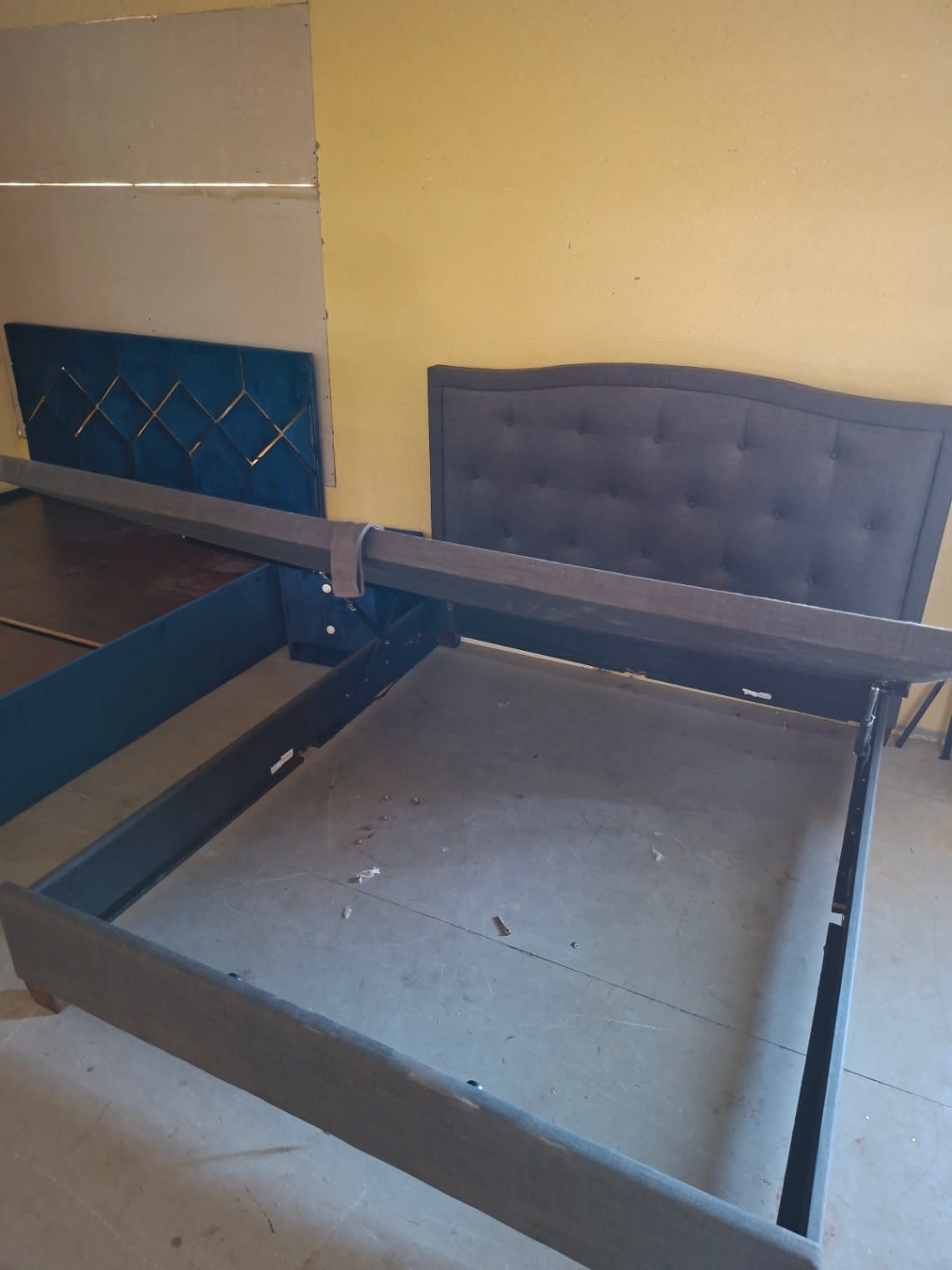 Under-bed storage compartment of used king hydraulic bed frame at Bufaisal Shop C Ajman