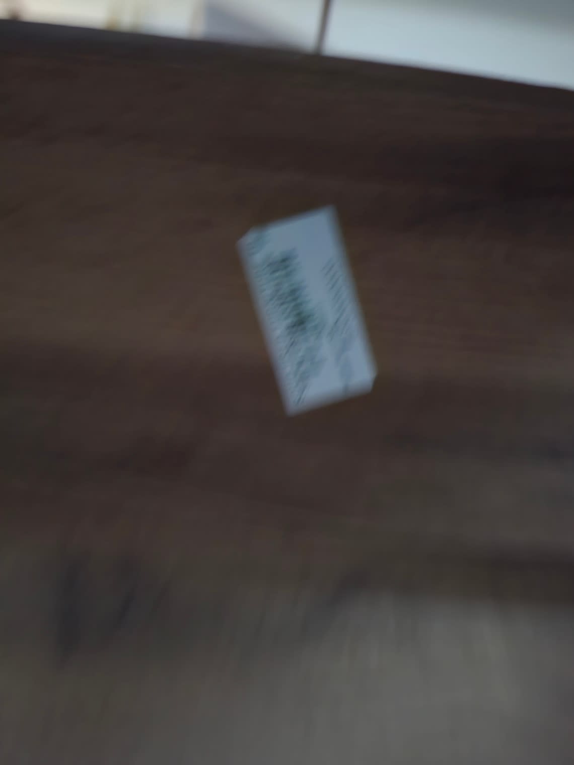 Bufaisal barcode label on used king bed frame — label unreadable in photo