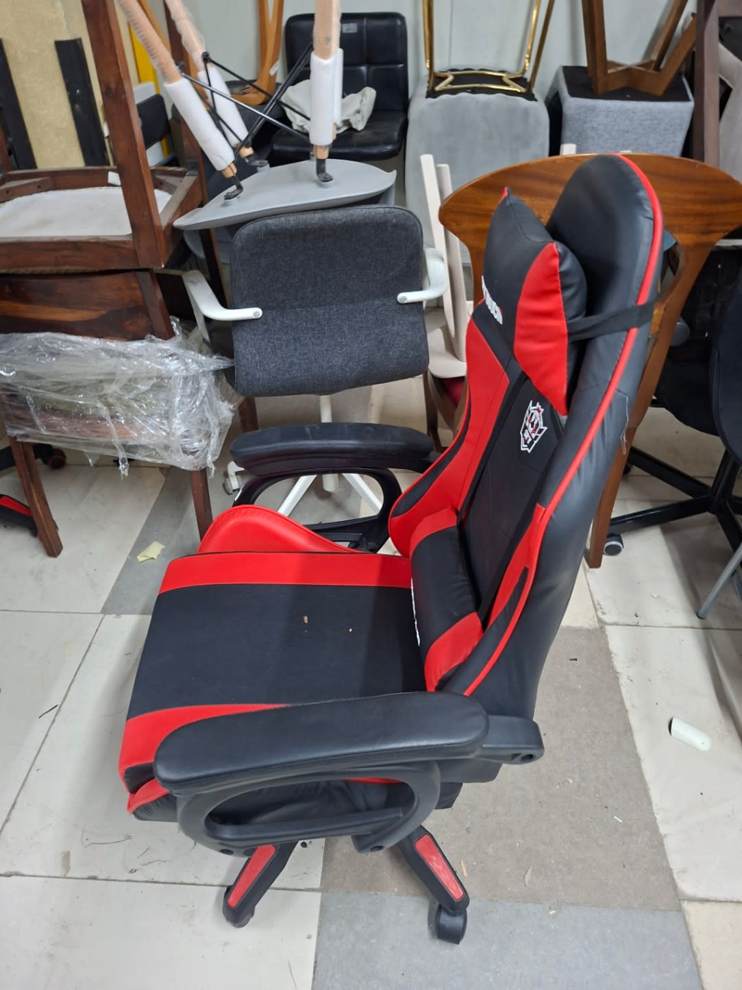 Second side view of used Sky Touch gaming chair black and red at Bufaisal Shop C Ajman