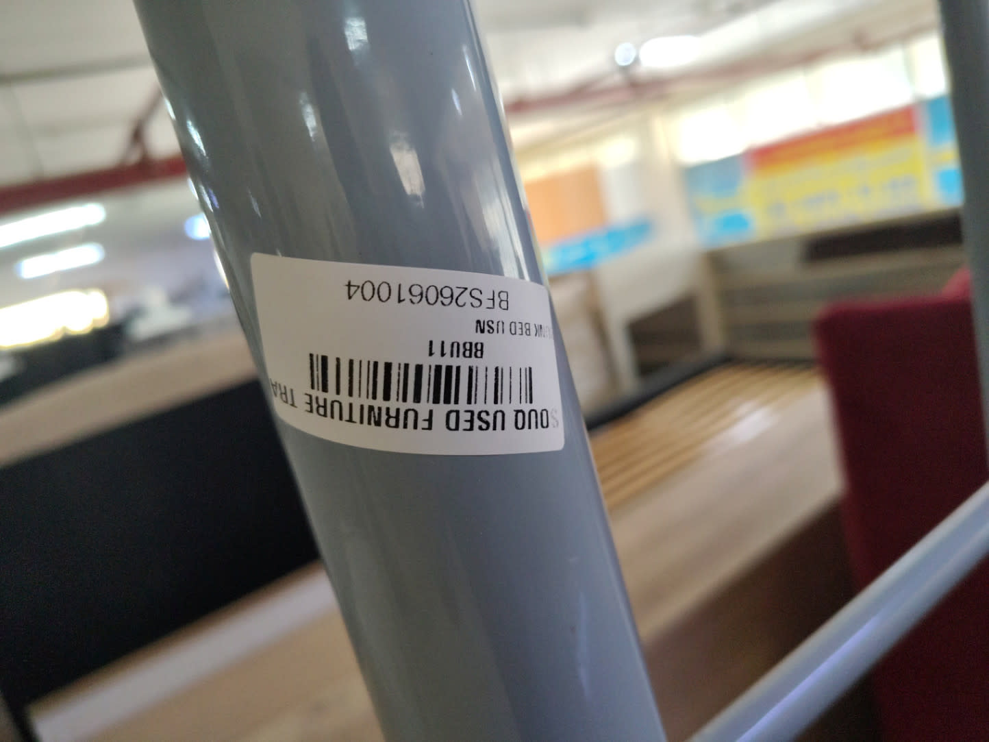 Bufaisal barcode label BFS26061004 on used metal bunk bed frame