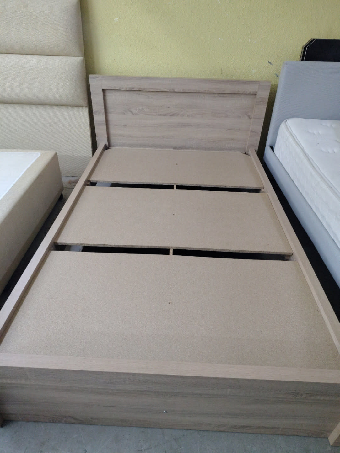 Fourth view of used single bed frame light oak MDF showing slat base detail