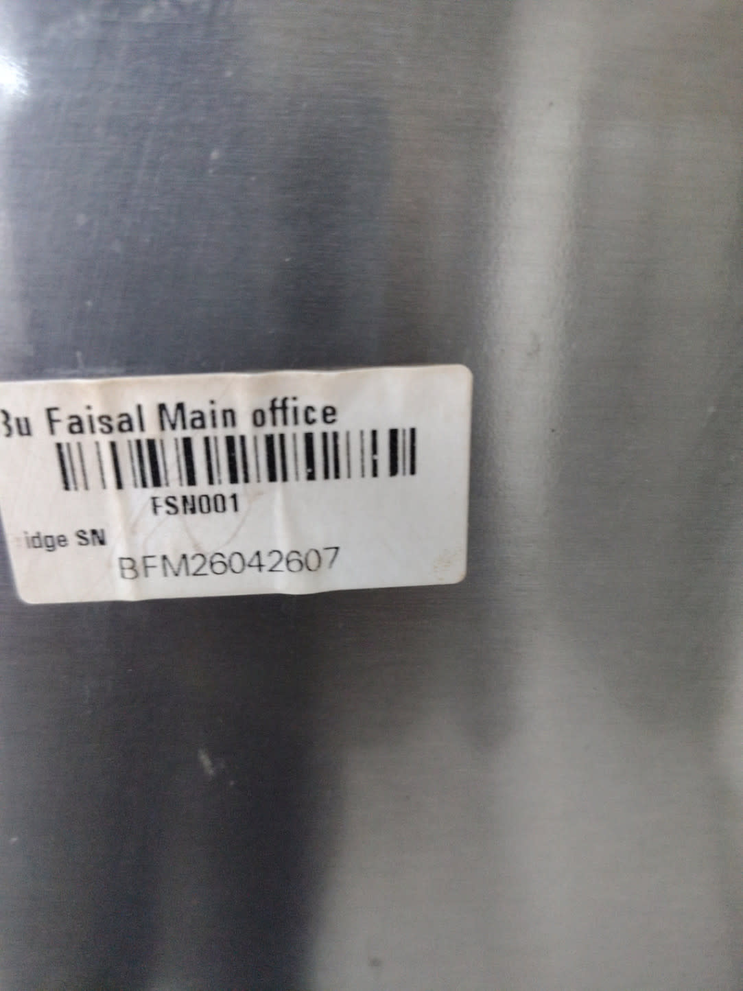 Bufaisal barcode label BFM26042607 for used Electrolux French door refrigerator at Shop C Ajman