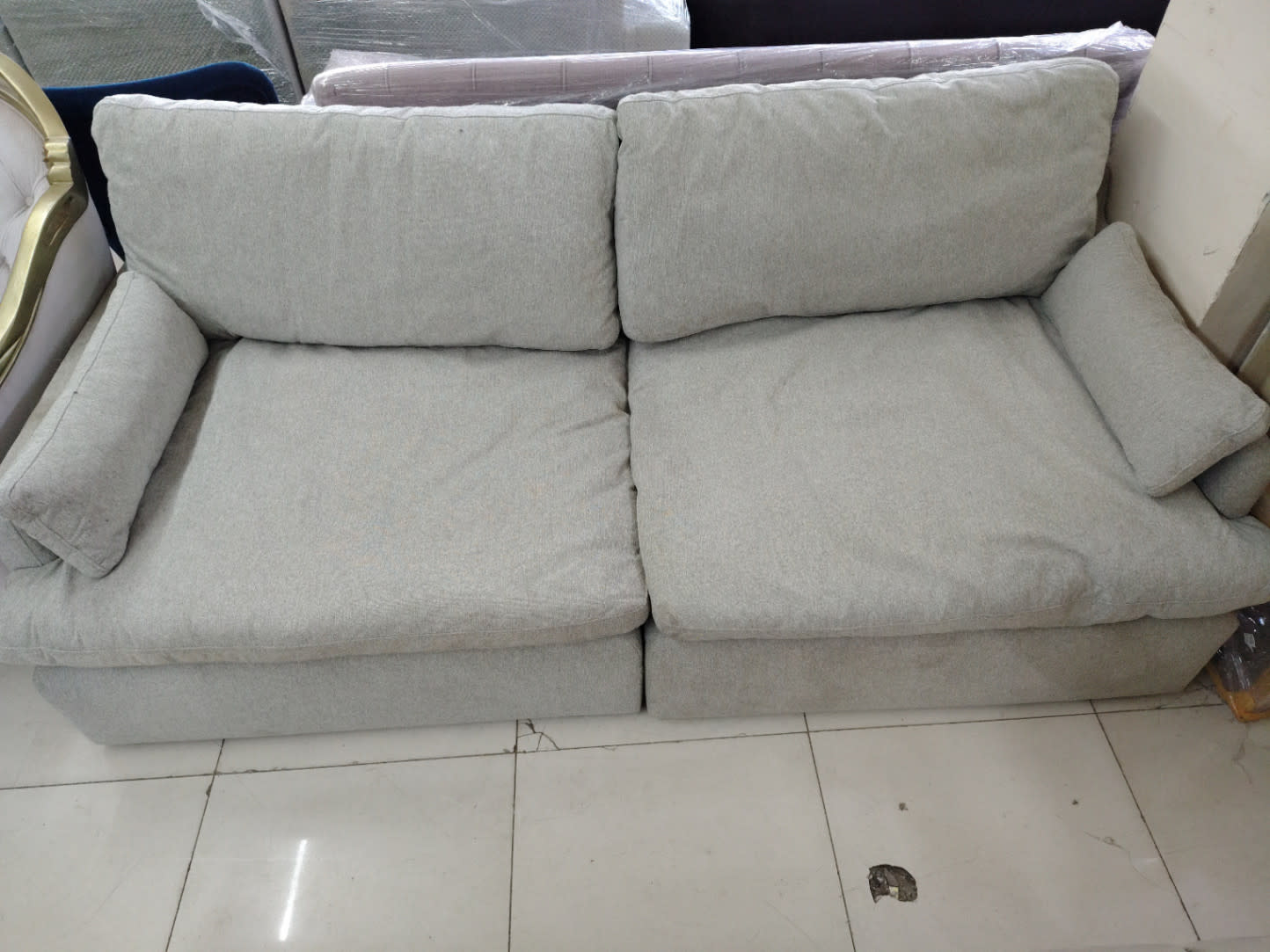 Bufaisal barcode label for used 2-seater light grey fabric sofa