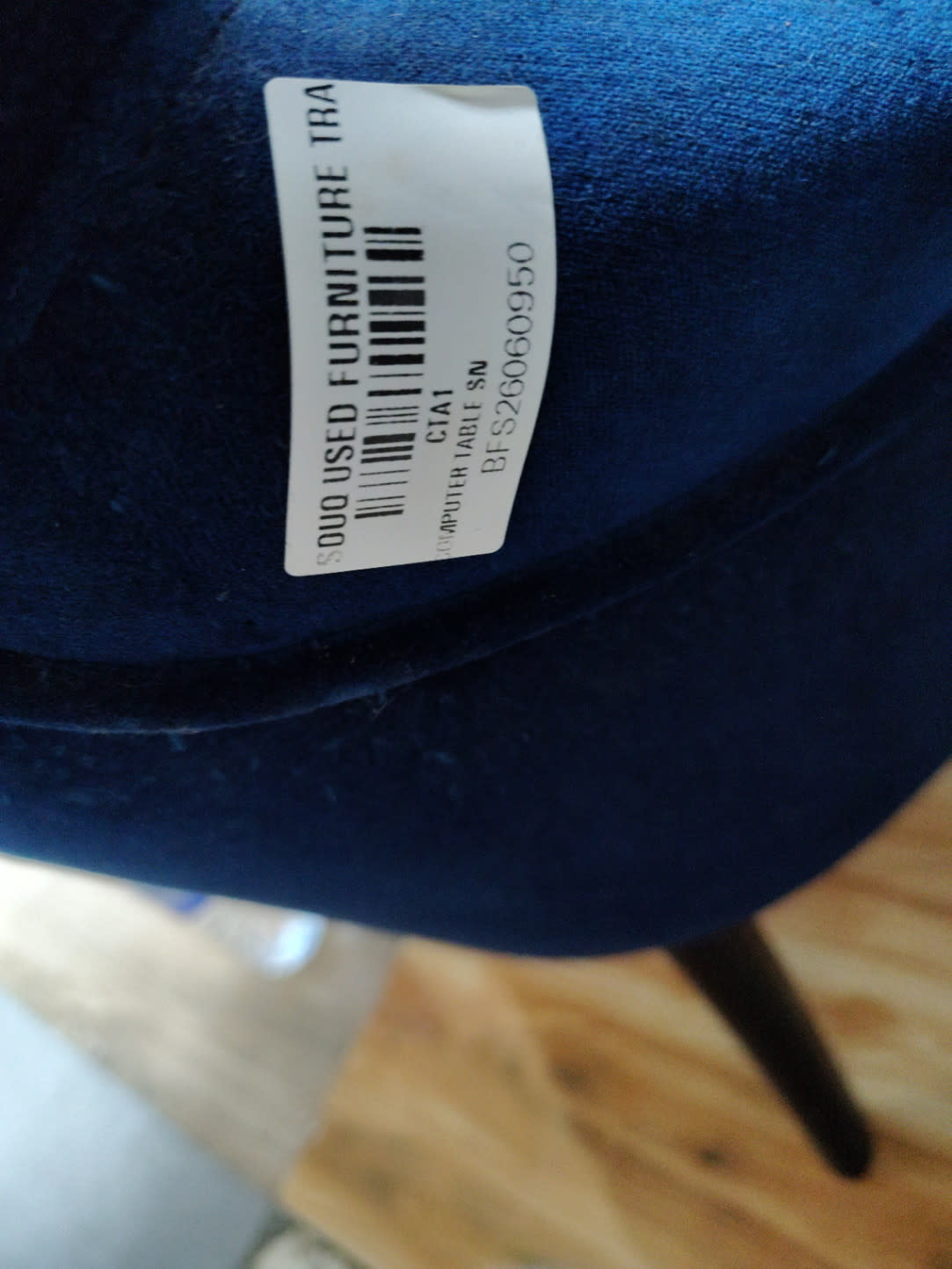 Bufaisal barcode label BFS26060950 on used blue velvet accent chair