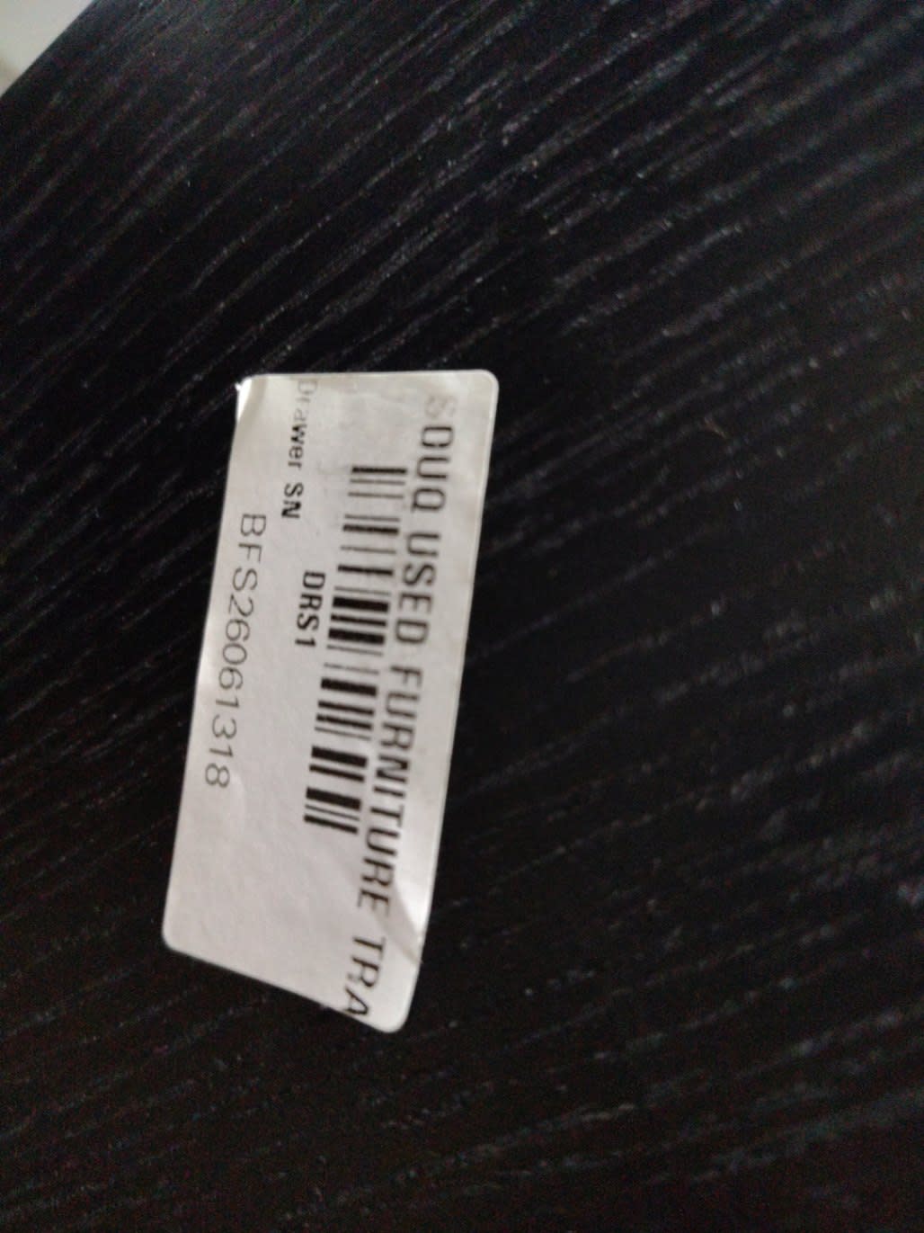 Bufaisal barcode label BFS26061318 for used black 4-drawer dresser