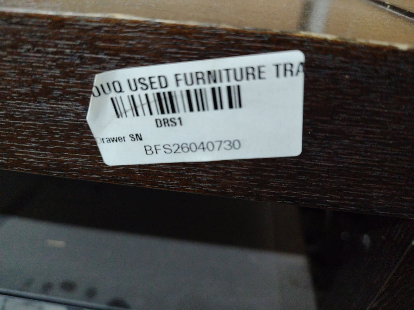 Bufaisal barcode label BFS26040730 for used bedside table at Shop C Ajman