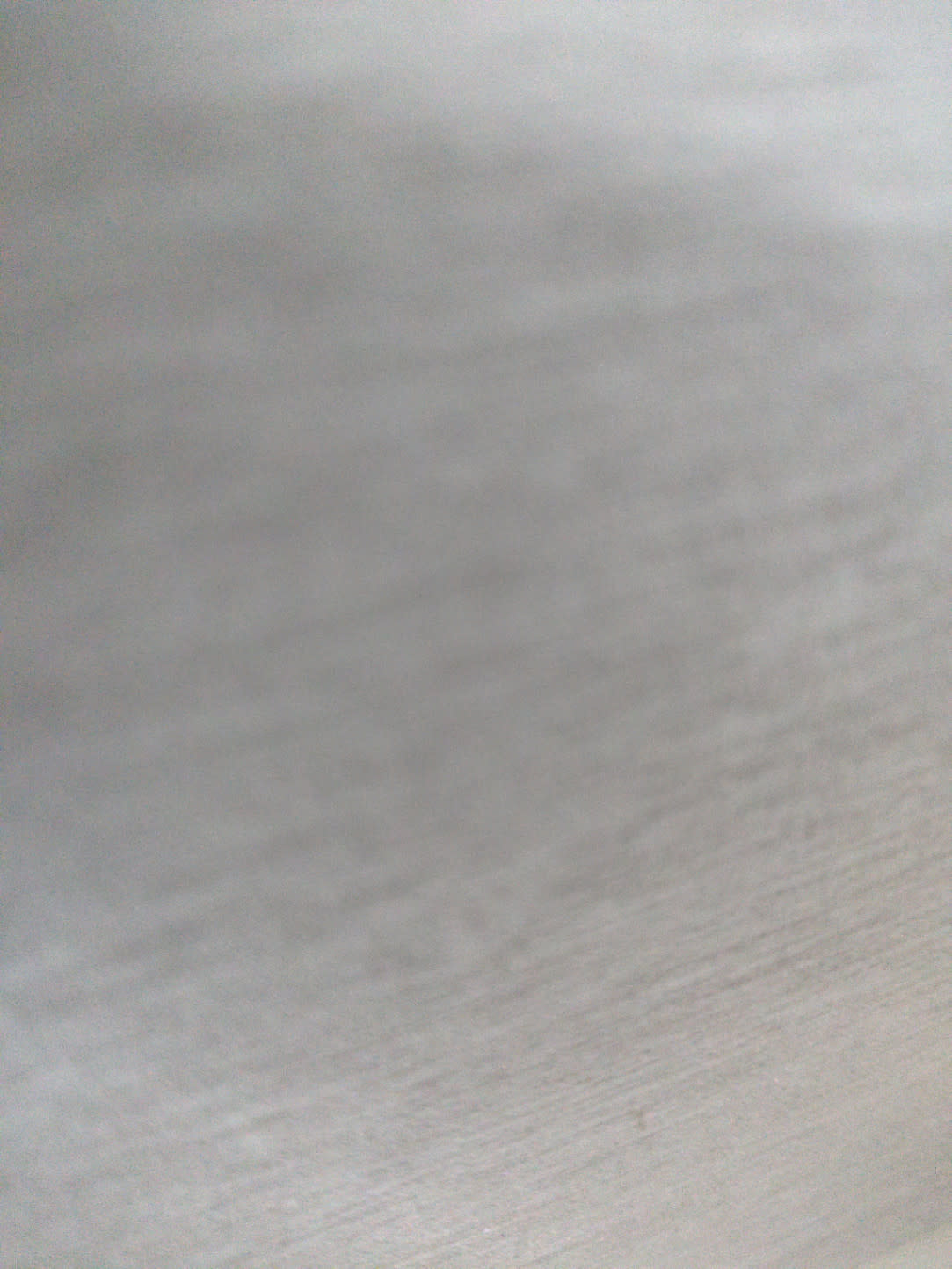 Barcode label photo for used 4-drawer dresser at Bufaisal Ajman — unreadable