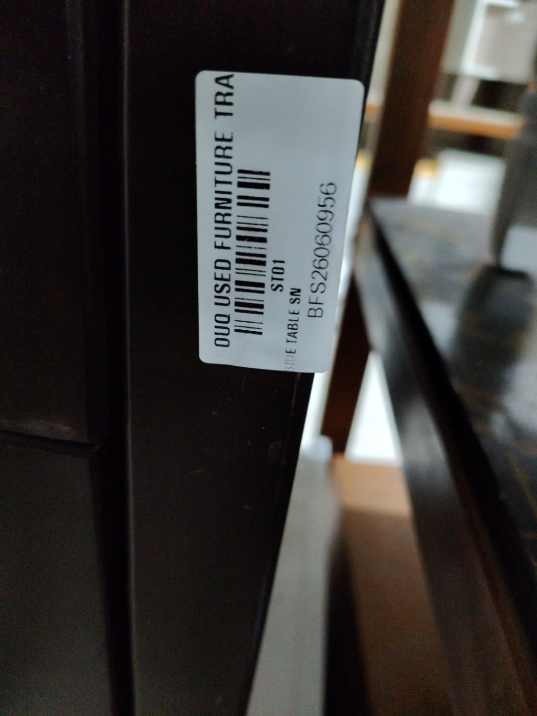 Bufaisal barcode label BFS260060956 for used 2-drawer bedside nightstand at Shop C Ajman