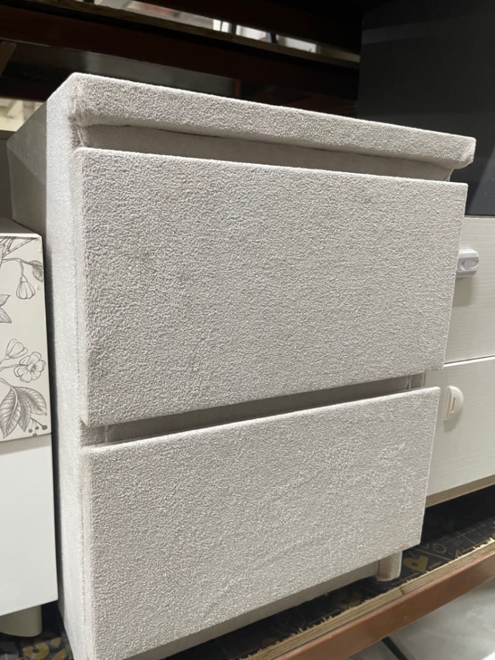 Close-up angle of used 2-drawer bouclé nightstand light grey at Bufaisal Ajman