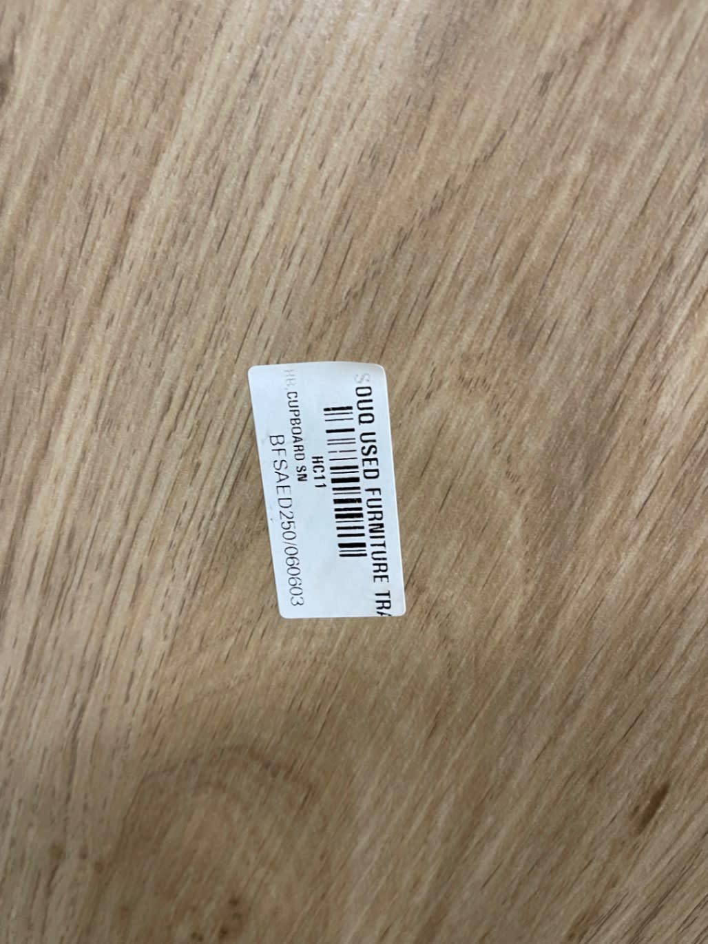 Bufaisal barcode label BFSAED250060603 for new two-door wardrobe at Shop C Ajman