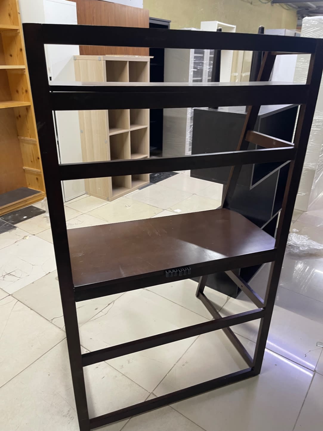 Bufaisal barcode label for used 4-tier folding ladder bookshelf at Shop C Ajman