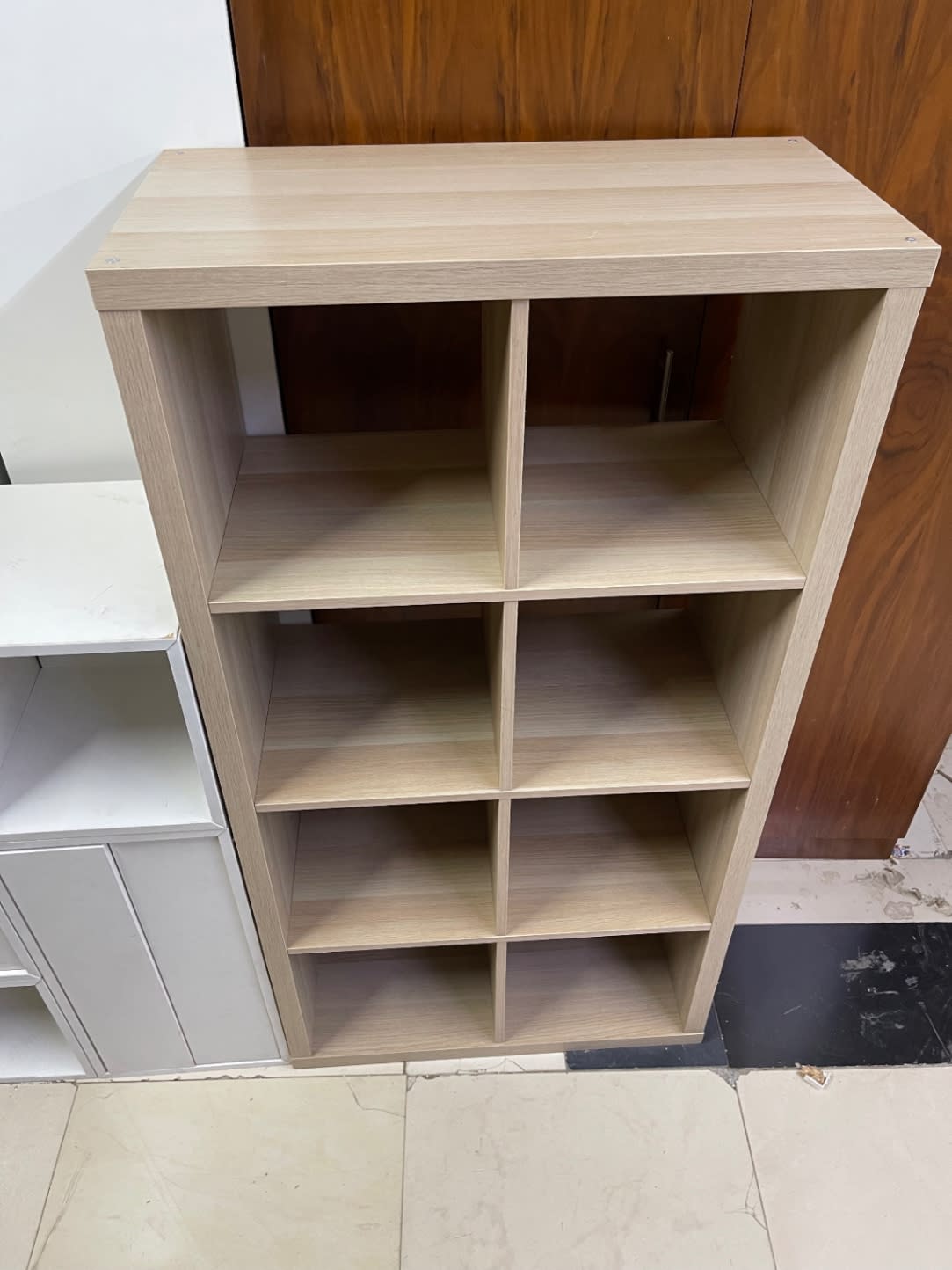 Bufaisal barcode label for used 8-cube open bookshelf at Shop C Ajman