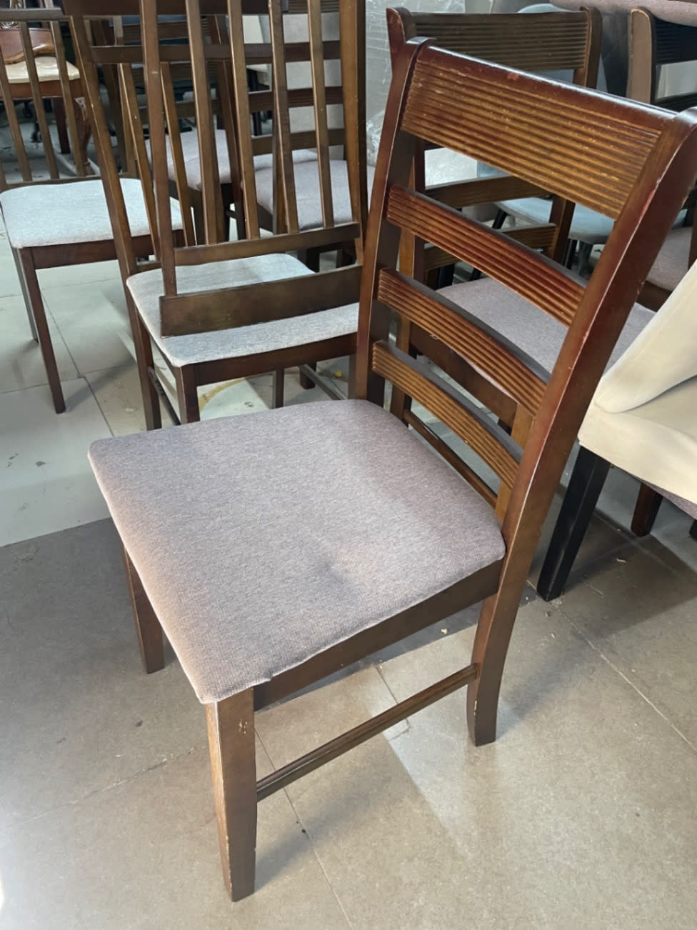 Bufaisal barcode label for new wooden dining chair item b996fb18 at Shop C Ajman