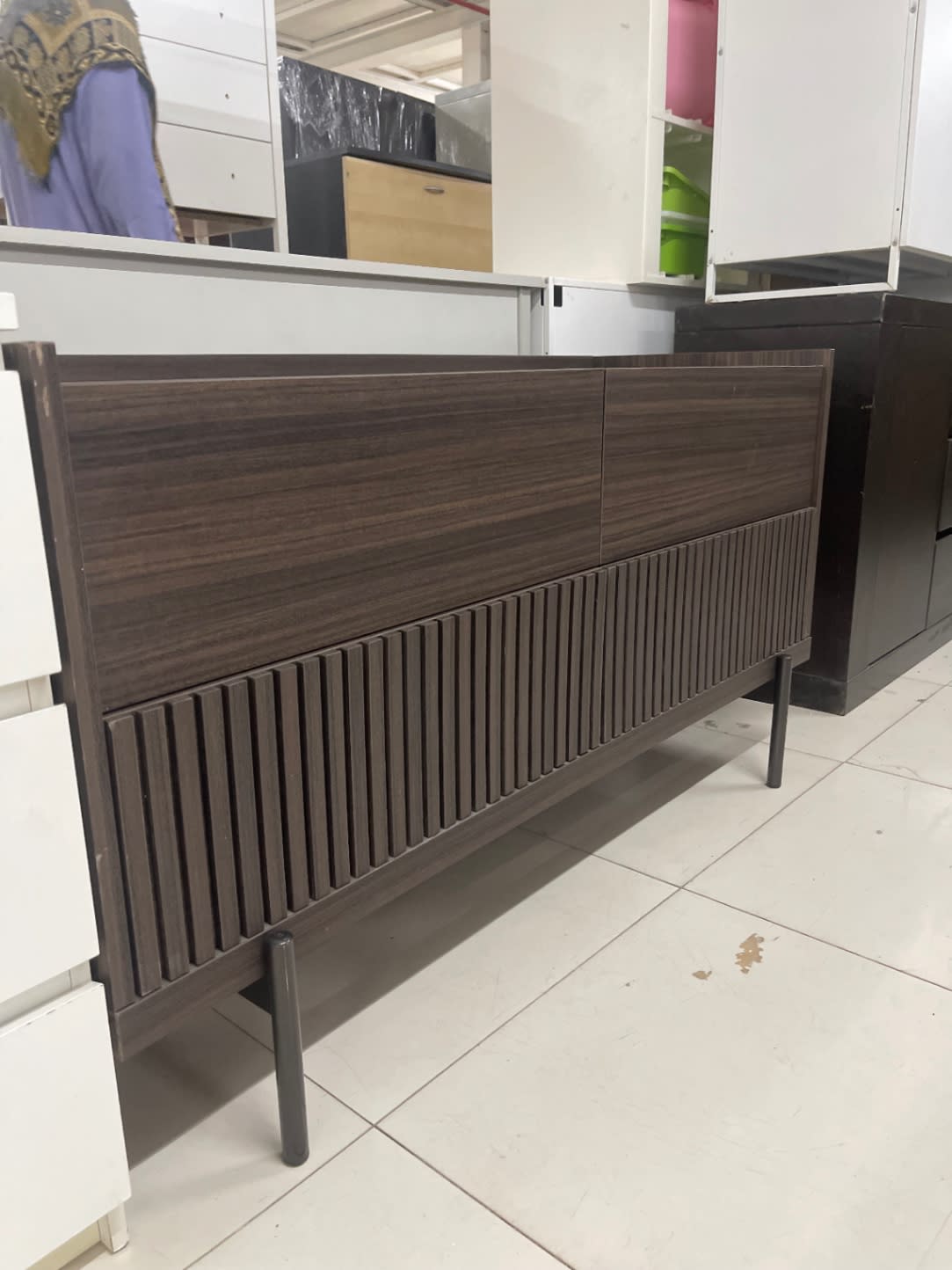 Rear angle of used 2-drawer fluted dresser dark walnut showing full profile and metal leg detail at Bufaisal Ajman