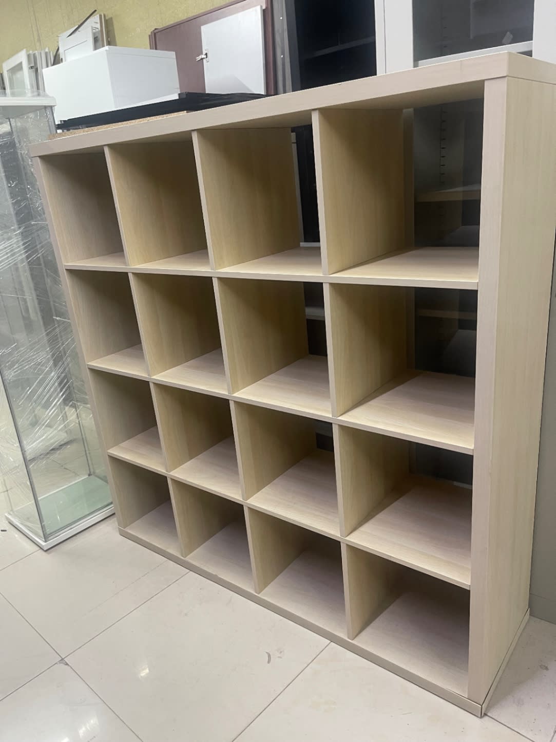 Bufaisal barcode label for used 16-cube storage shelving unit at Shop C Ajman