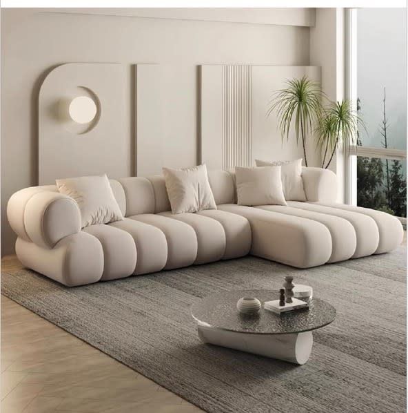New channel-quilted L-shape sectional sofa in cream fabric, catalogue reference view, Bufaisal Ajman