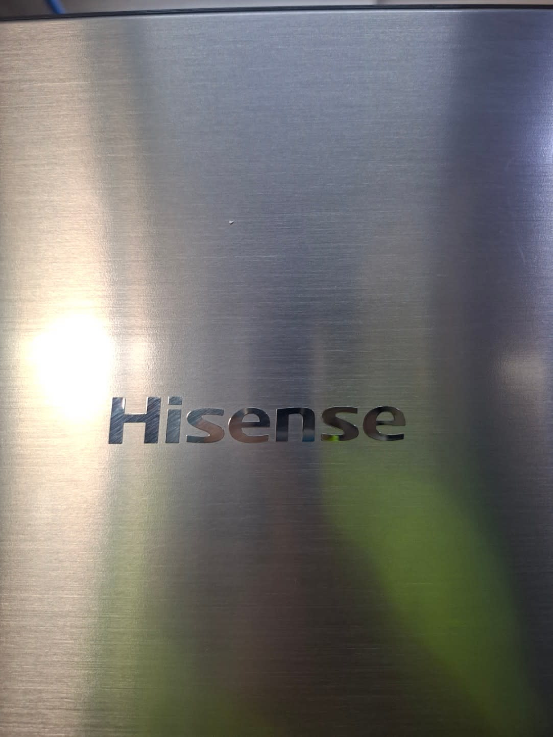 Door bins and interior detail of used Hisense top-mount freezer refrigerator at Bufaisal Shop B Ajman