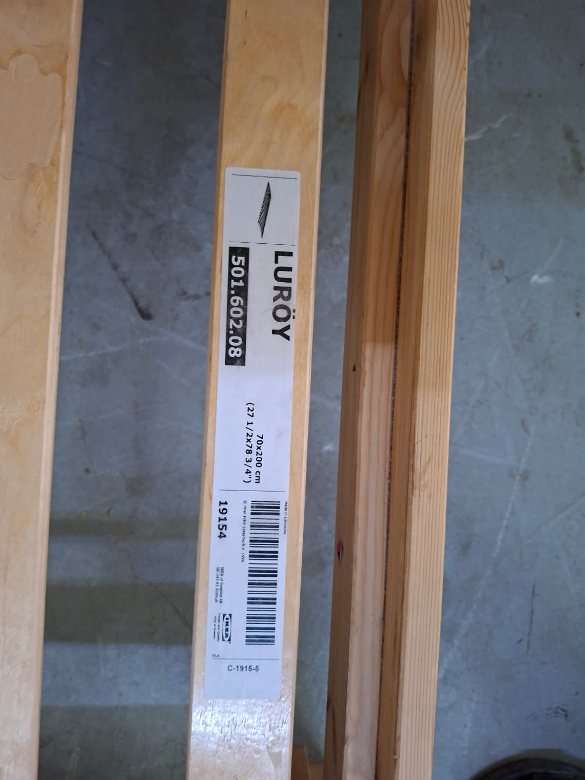 IKEA LURÖY product label showing model 501.602.08 and size 70x200 cm on slatted bed base
