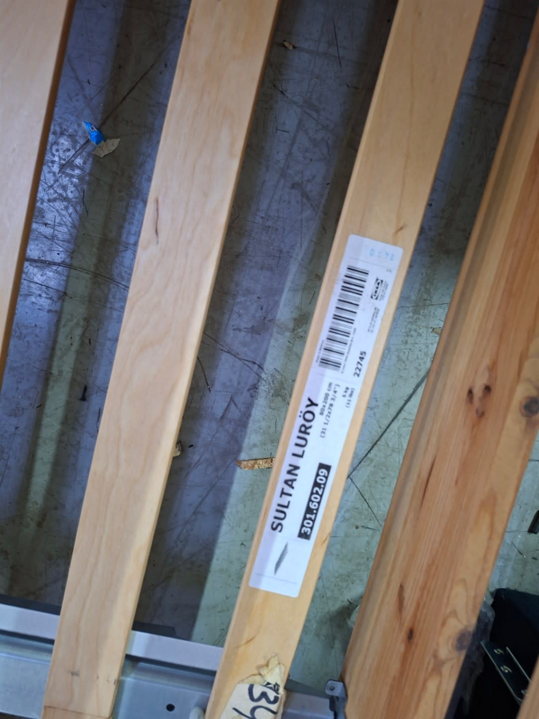 IKEA SULTAN LURÖY label 301.602.09 on slatted base of used IKEA queen bed frame