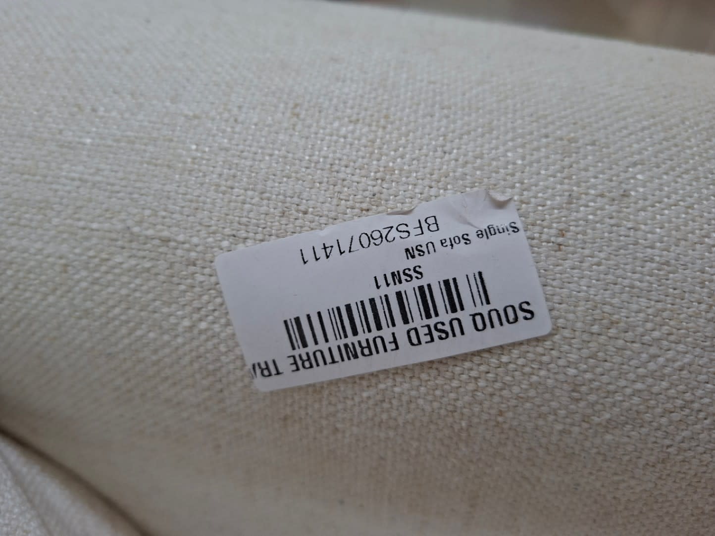 Bufaisal barcode label BFS26071411 for used 3-seater cream fabric sofa
