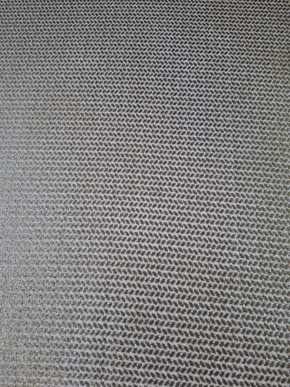 Close-up of beige woven fabric texture on used 2-seater sofa at Bufaisal Shop C Ajman