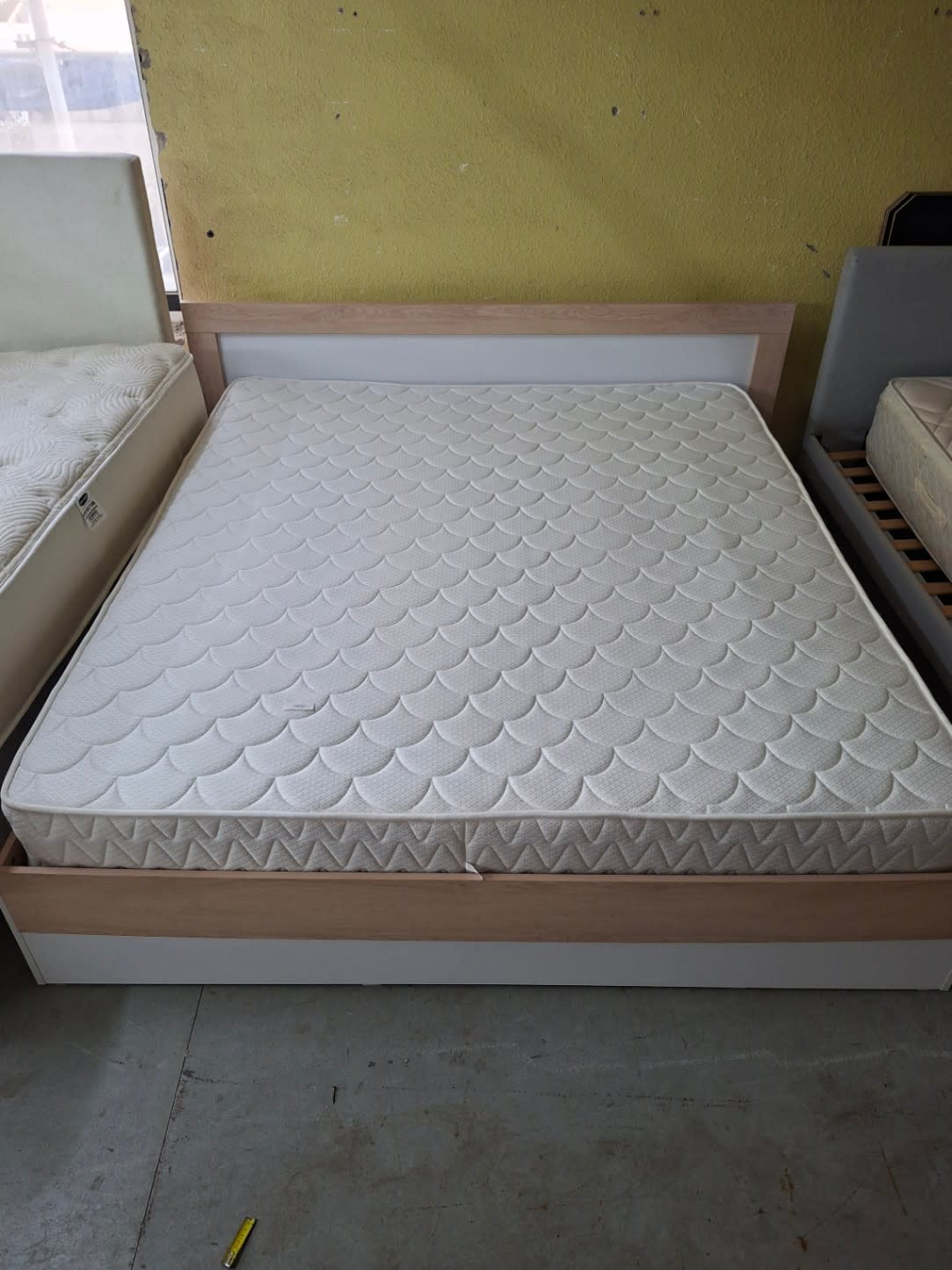 Full view of used king bed frame with mattress, oak and white two-tone finish, Bufaisal Ajman
