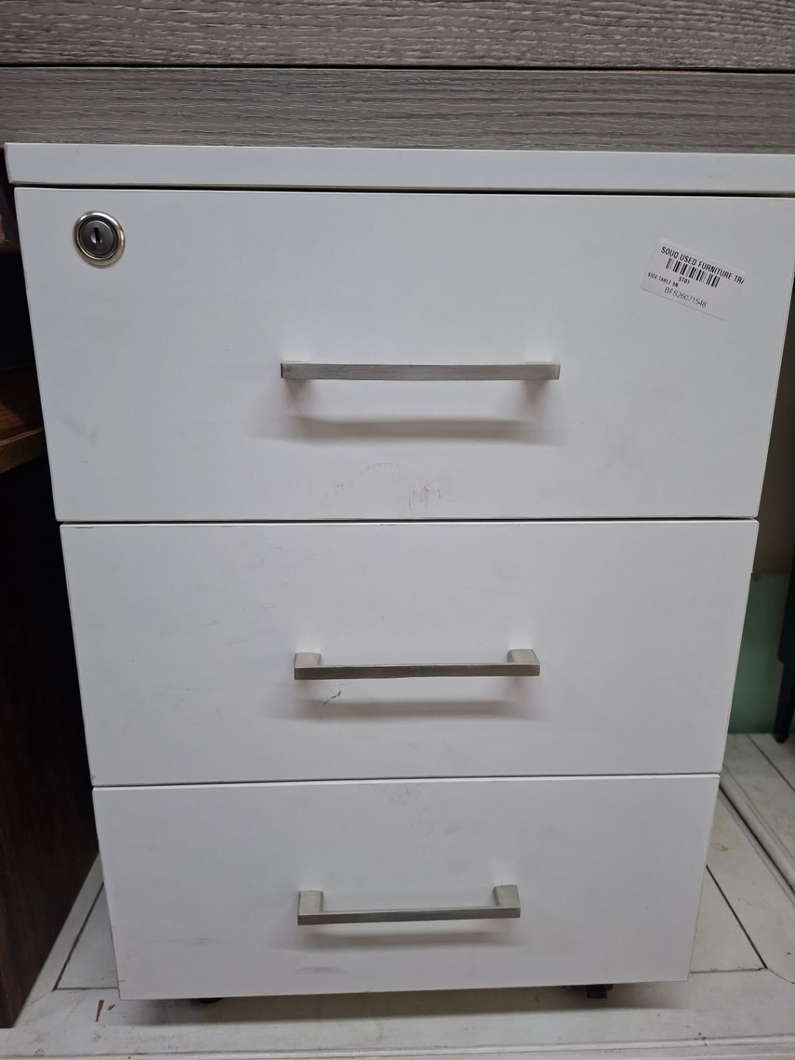 under-desk office filing pedestal with a white finish.
