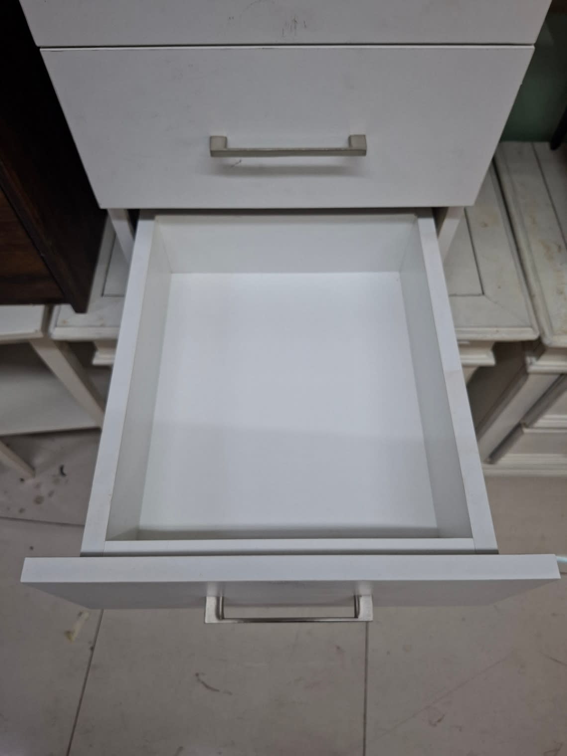 under-desk office filing pedestal with a white finish. 2