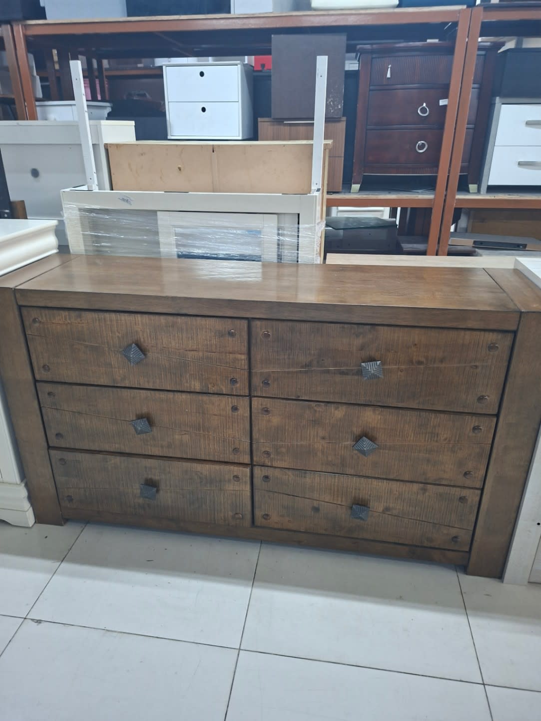 six-drawer double dresser crafted in a distinct rustic or farmhouse style.