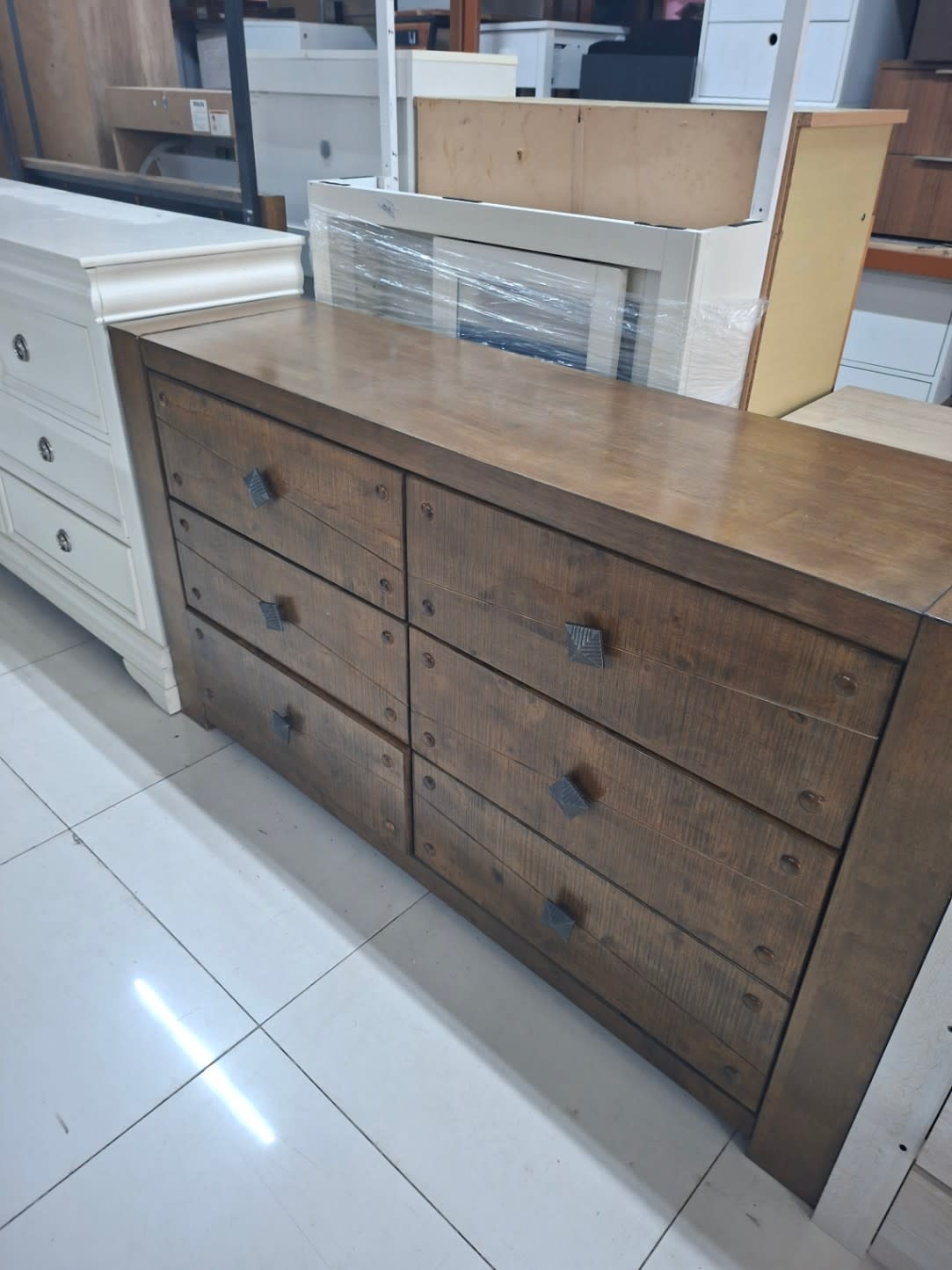 six-drawer double dresser crafted in a distinct rustic or farmhouse style. 2