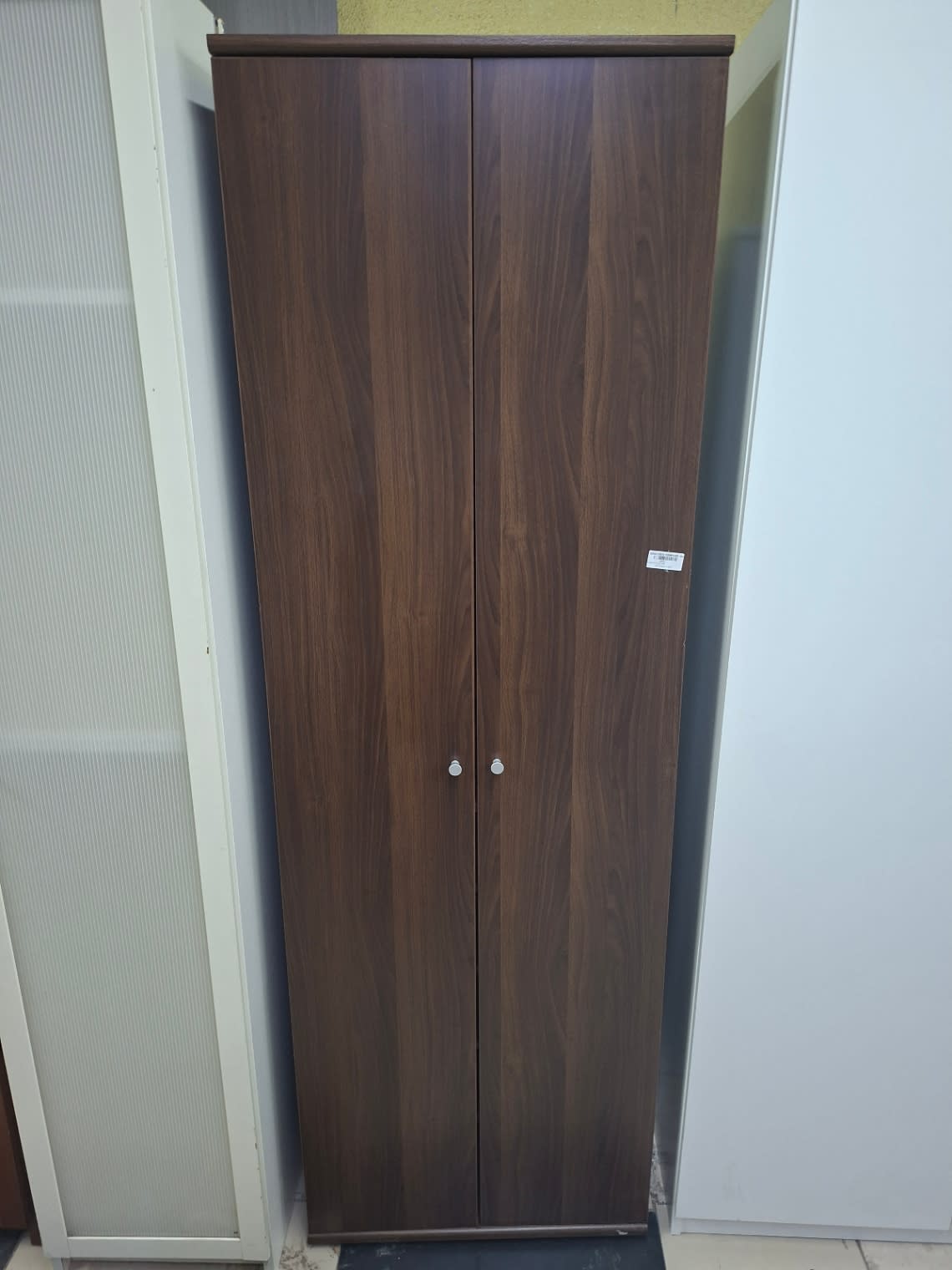 tall, freestanding wooden shoe cabinet