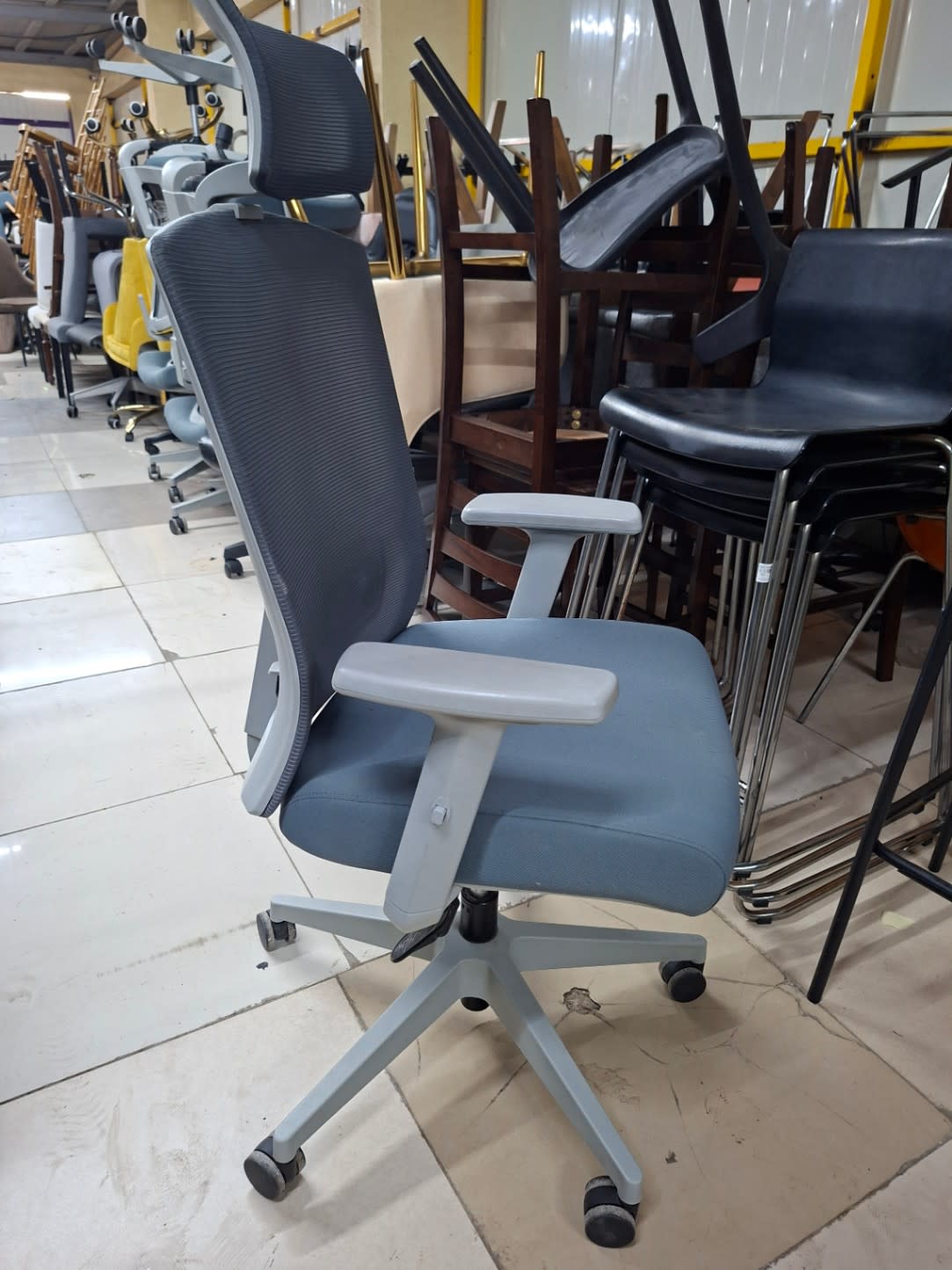 grey ergonomic office desk chair on wheels 2